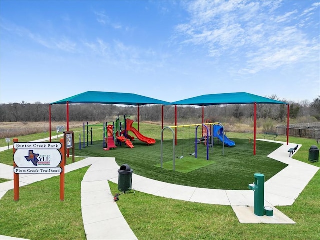 view of playground featuring a yard