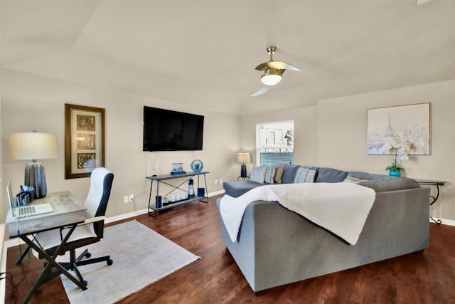 living room with lofted ceiling and dark hardwood / wood-style floors