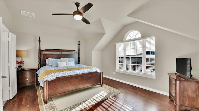 bedroom featuring ceiling fan, lofted ceiling, and dark hardwood / wood-style flooring