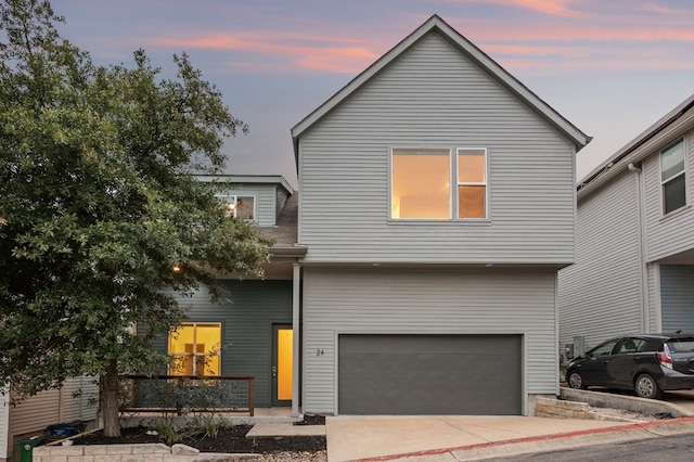 view of front of property with a garage