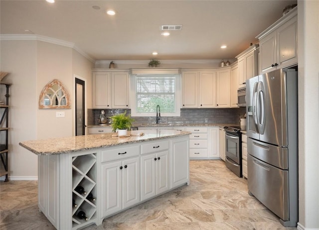 112 Chaumont St, Kingsland, TX 78639 - kitchen with a center island, ornamental molding, visible vents, open shelves, and stainless steel appliances