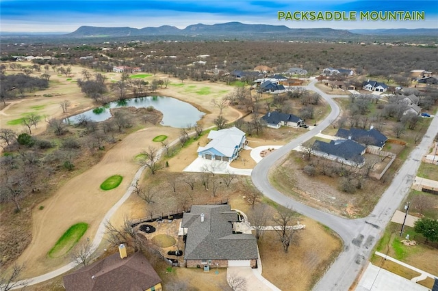 112 Chaumont St, Kingsland, TX 78639 - aerial view of property and surrounding area featuring a water and mountain view, nearby suburban area, and a local golf course