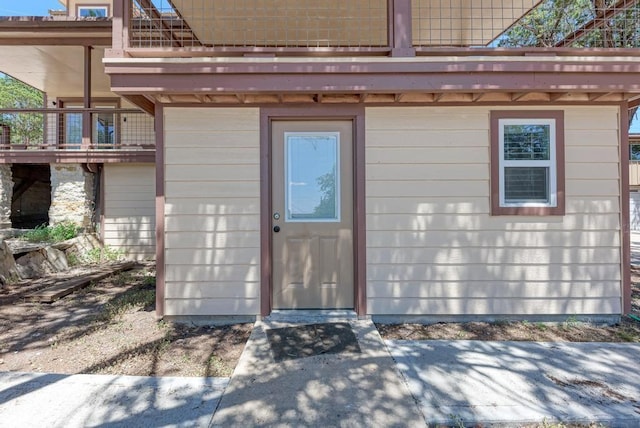 doorway to property with a balcony