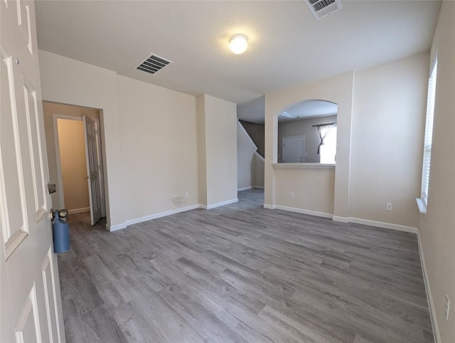 empty room featuring hardwood / wood-style floors