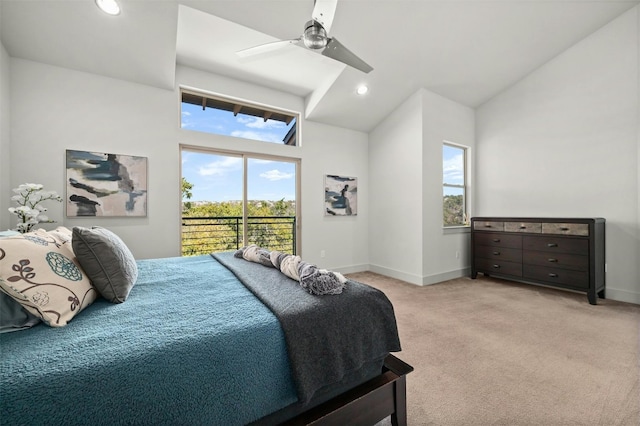 bedroom featuring vaulted ceiling, access to outside, light colored carpet, and multiple windows