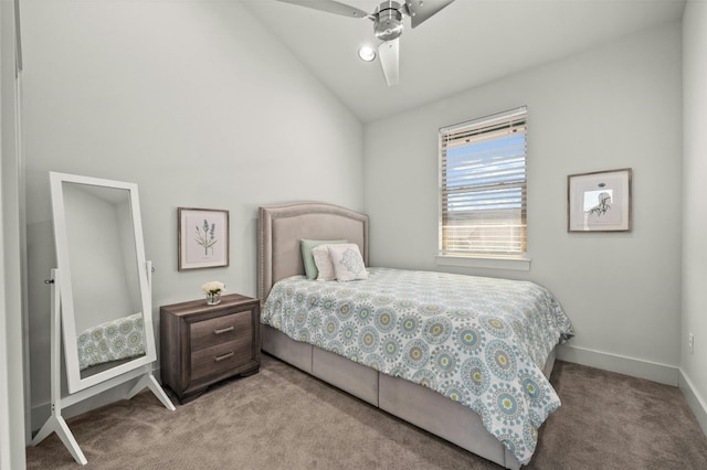 carpeted bedroom featuring a ceiling fan, baseboards, and high vaulted ceiling