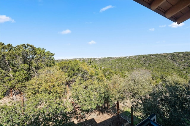 view of landscape featuring a view of trees