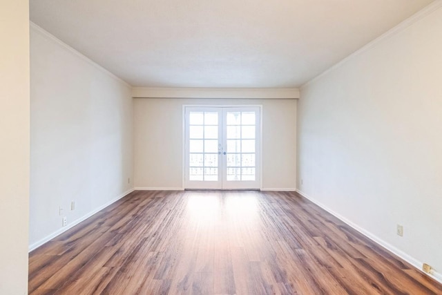 7920 Rockwood Ln Unit 202, Austin, TX 78757 - empty room with wood finished floors, ornamental molding, french doors, and baseboards
