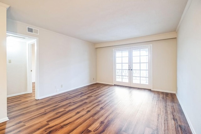 7920 Rockwood Ln Unit 202, Austin, TX 78757 - empty room with wood finished floors, ornamental molding, french doors, and baseboards
