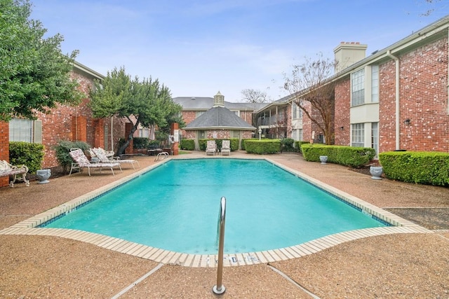 7920 Rockwood Ln Unit 202, Austin, TX 78757 - community pool featuring a gazebo and a patio