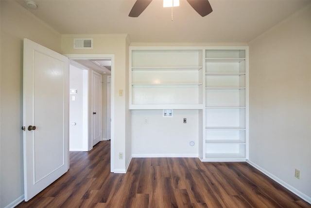 7920 Rockwood Ln Unit 202, Austin, TX 78757 - unfurnished bedroom featuring dark wood-style flooring, baseboards, and a ceiling fan