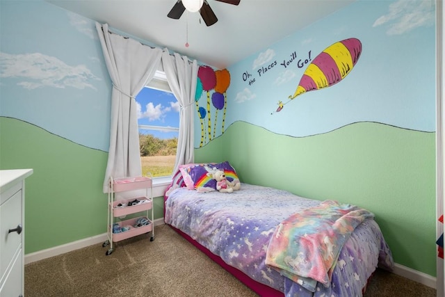 carpeted bedroom with baseboards and a ceiling fan
