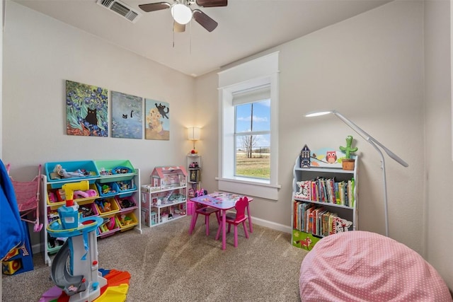 recreation room with visible vents, baseboards, carpet, and a ceiling fan