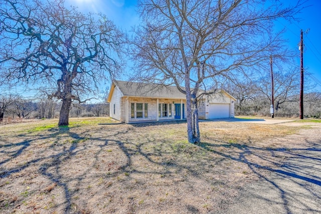 1504 Timber Valley Ln, Granite Shoals, TX 78654 - ranch-style home featuring an attached garage and driveway