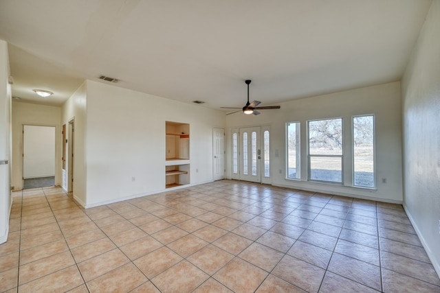 1504 Timber Valley Ln, Granite Shoals, TX 78654 - spare room with ceiling fan, light tile patterned floors, and built in features