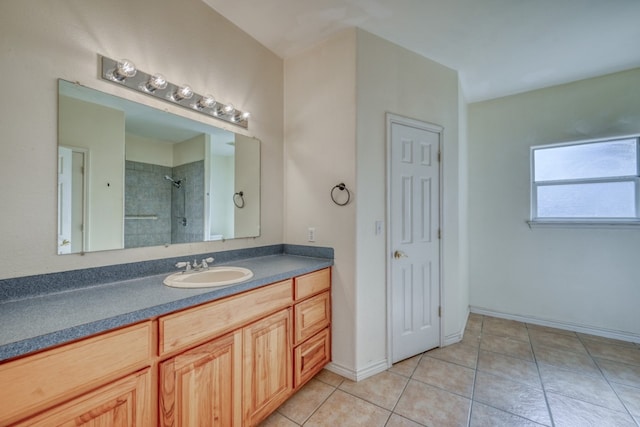 1504 Timber Valley Ln, Granite Shoals, TX 78654 - full bath with tiled shower, vanity, and tile patterned flooring