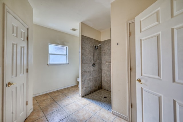 1504 Timber Valley Ln, Granite Shoals, TX 78654 - full bath with a tile shower and tile patterned flooring