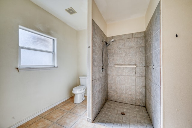 1504 Timber Valley Ln, Granite Shoals, TX 78654 - bathroom with a tile shower and tile patterned flooring