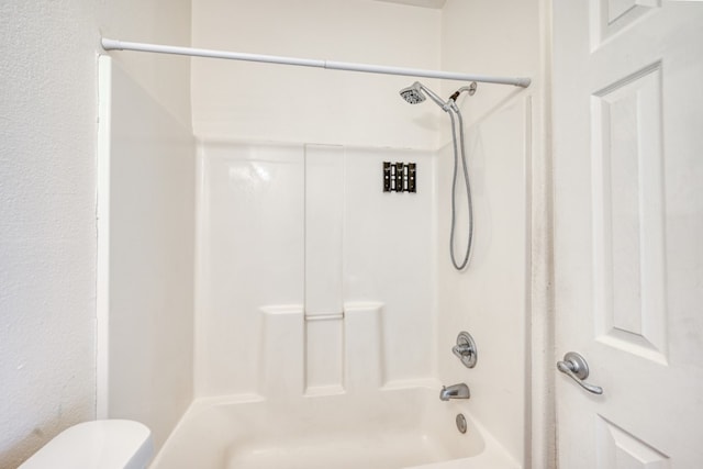 1504 Timber Valley Ln, Granite Shoals, TX 78654 - bathroom featuring toilet and tub / shower combination