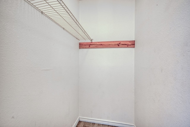 1504 Timber Valley Ln, Granite Shoals, TX 78654 - spacious closet featuring wood finished floors