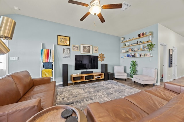 living room with vaulted ceiling and ceiling fan