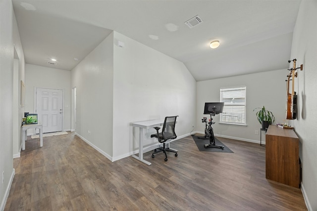 office with lofted ceiling and wood-type flooring