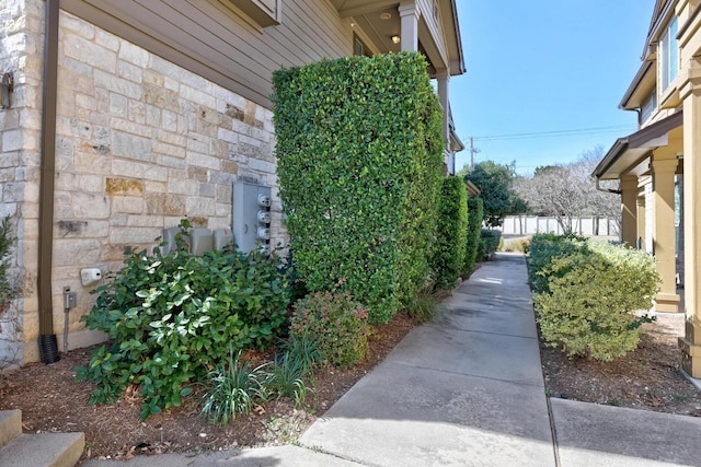 view of home's exterior with stone siding