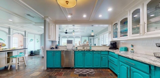 kitchen with sink, ceiling fan, white cabinetry, light stone counters, and stainless steel dishwasher