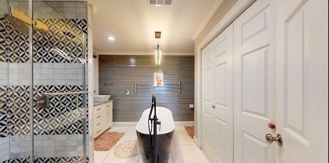 bathroom featuring vanity, shower with separate bathtub, tile patterned floors, and wooden walls