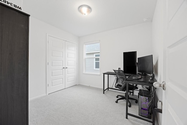 home office with light colored carpet