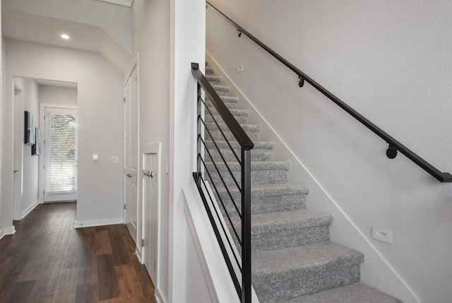 stairway with wood-type flooring