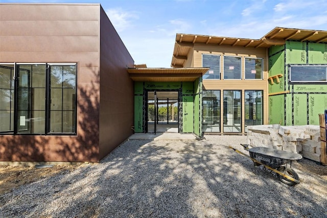 rear view of house featuring a patio area