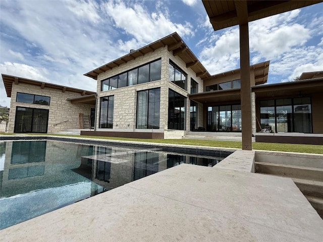 4600 Wild Cow Cv, Spicewood, TX 78669 - outdoor pool with a patio area