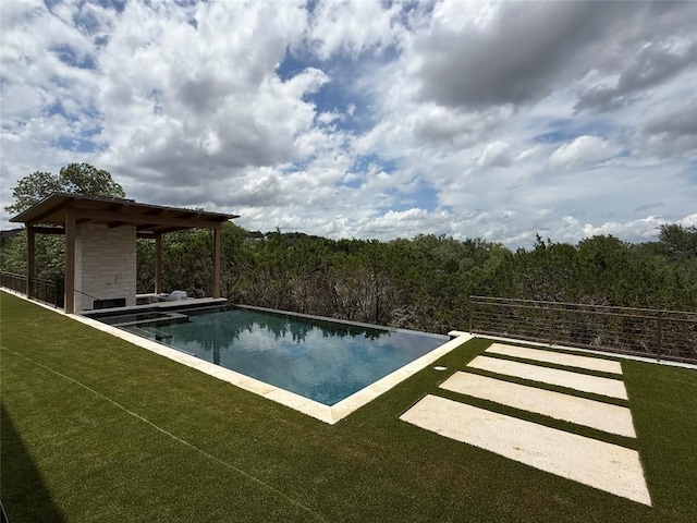 4600 Wild Cow Cv, Spicewood, TX 78669 - view of swimming pool with an infinity pool, a yard, and a forest view
