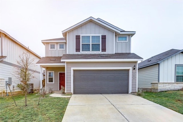 view of front facade featuring a garage and a front lawn