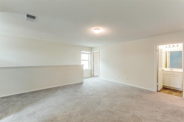 empty room with light carpet