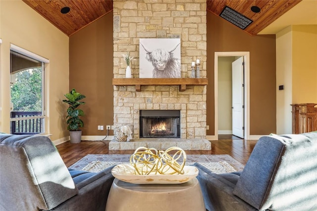 living room with dark wood-type flooring, a fireplace, high vaulted ceiling, and wooden ceiling