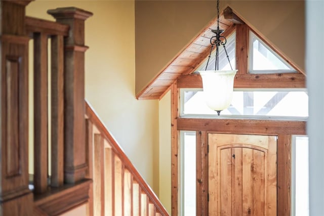 foyer featuring high vaulted ceiling