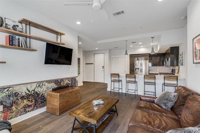 1800 E 4th St Unit 337, Austin, TX 78702 - living room featuring wood finished floors, a ceiling fan, and recessed lighting
