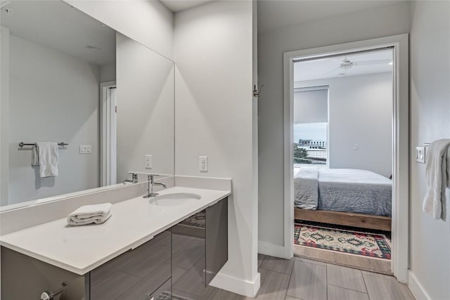 1800 E 4th St Unit 337, Austin, TX 78702 - ensuite bathroom with baseboards and vanity