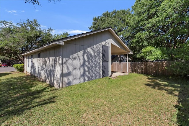 9145 Swanson Ln, Austin, TX 78748 - view of side of home featuring a lawn and fence