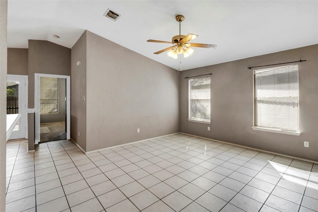 9145 Swanson Ln, Austin, TX 78748 - empty room with visible vents, lofted ceiling, baseboards, ceiling fan, and light tile patterned floors