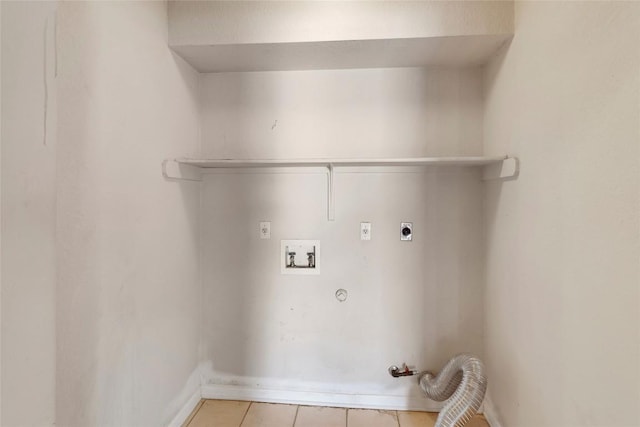 9145 Swanson Ln, Austin, TX 78748 - laundry room with washer hookup, hookup for an electric dryer, laundry area, hookup for a gas dryer, and light tile patterned floors