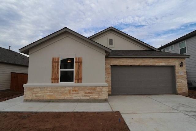 ranch-style home with a garage