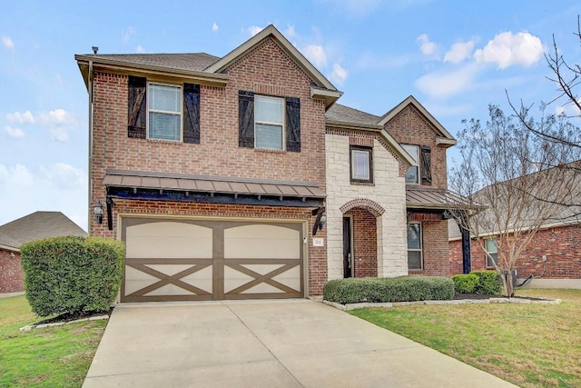 front facade with a garage and a front yard