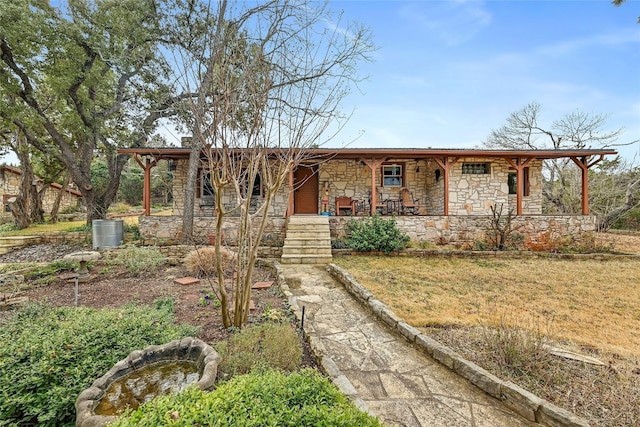 single story home with a front lawn and a porch