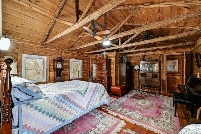 525 Plant Lady Ln, Dripping Springs, TX 78620 - bedroom with wooden walls, beam ceiling, high vaulted ceiling, wooden ceiling, and wood finished floors