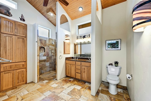 525 Plant Lady Ln, Dripping Springs, TX 78620 - full bath featuring walk in shower, toilet, wood ceiling, high vaulted ceiling, and stone tile floors