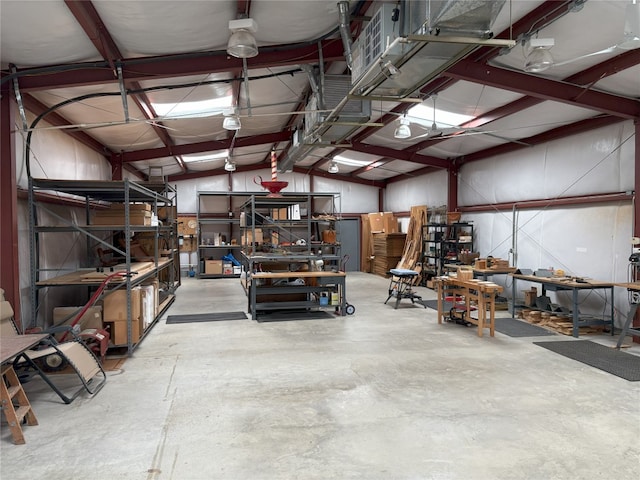 525 Plant Lady Ln, Dripping Springs, TX 78620 - garage featuring a workshop area