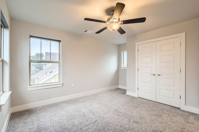 10610 Wills Loop, Austin, TX 78717 - unfurnished bedroom featuring carpet floors, a closet, and ceiling fan
